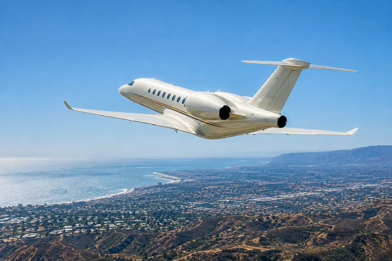 Private jet climbing out over Los Angeles